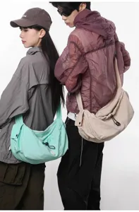 Casual large capacity nylon crossbody shoulder bag for men and women outdoor travel daily.