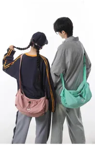Large capacity casual crossbody bag for travel, lightweight nylon shoulder bag for daily use.