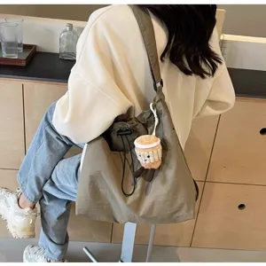 Bolso de hombro de lona ligera para mujer, bolso tote grande y cruzado de uso diario.