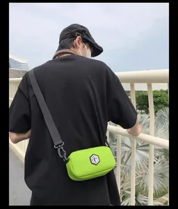 Neon green small crossbody bag, waterproof portable shoulder bag for daily casual outdoor use.