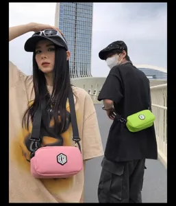 Stylish waterproof crossbody bag for men and women, portable shoulder phone bag for daily use.