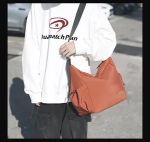 Large capacity canvas crossbody bag for men and women, casual lightweight shoulder messenger bag.