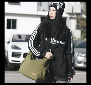 Large capacity canvas crossbody bag for women casual lightweight messenger shoulder bag.