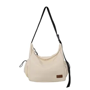 Large capacity canvas crossbody shoulder bag for casual travel and daily use with adjustable strap.