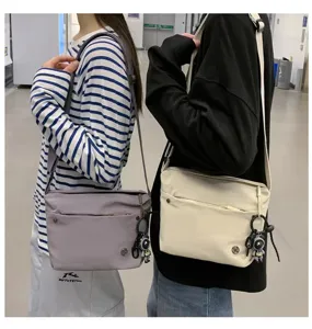 Lightweight nylon women crossbody bag, waterproof casual shoulder bag for daily use.