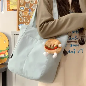 Casual minimalist canvas tote bag for women, large capacity shoulder bag for daily student commute.