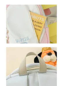 Detail view of the cute Japanese style colorblock backpack front pocket and top handle.