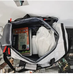 Large capacity duffel bag interior detail, showing spacious storage for sports and travel.