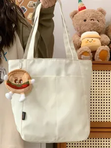 Japanese style casual canvas tote bag for women, large capacity shoulder bag with cute plush.