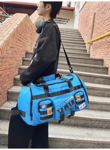 Grande borsone da viaggio blu da uomo, borsa sportiva fitness all'aperto con tasche multiple.