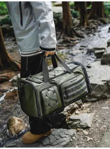 Outdoor travel duffel bag detail showcasing durable waterproof fabric and multiple pockets.