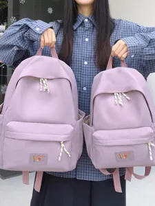 Casual minimalist women's backpack school bag in light purple, dual size display main view