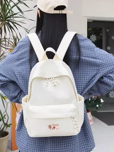 Casual white canvas backpack for women, stylish minimalist school bag for daily commute.