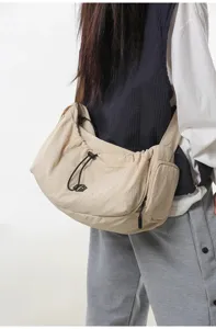 Lightweight outdoor travel bag large capacity casual crossbody shoulder bag for daily use.