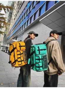 Detailed shot of large capacity multi-functional travel backpack with multiple pockets and straps.