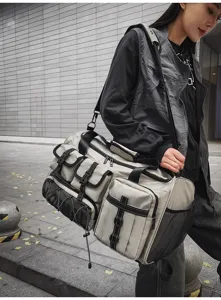 Detailed view of large capacity travel duffel bag with multi pockets and durable straps.