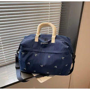 Large capacity travel duffel bag with cute bow embroidery, lightweight gym and weekend bag.