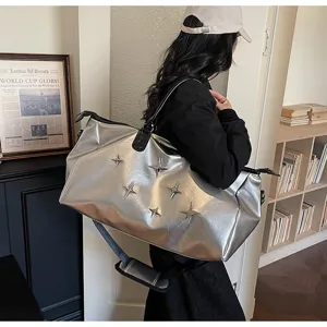 Large silver metallic travel duffel bag with star studs, lightweight gym weekender bag.