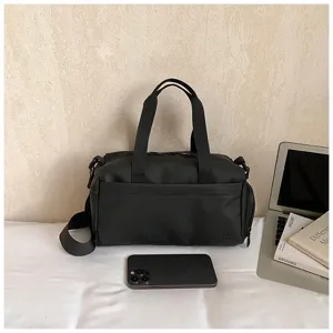 Waterproof gym bag for men and women, lightweight travel duffel bag with strap, black.
