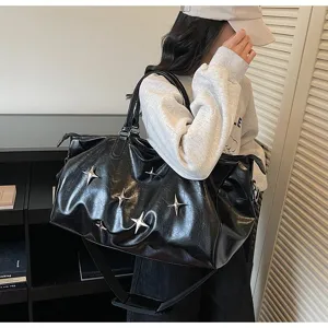 Black PU leather travel duffel bag with silver star studs, large capacity gym bag.