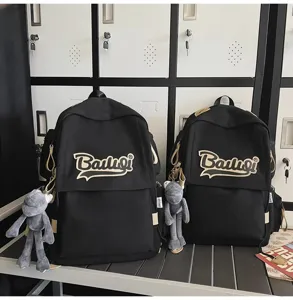 Casual black backpack detail view, large capacity school bag for students and daily travel.