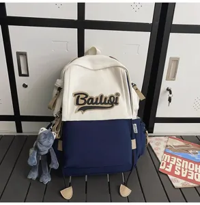 Detailed view of large capacity color block casual backpack for students school travel daily use