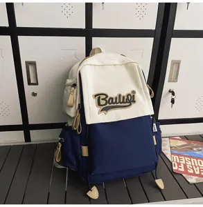 Canvas student backpack with large capacity, ideal for daily school and travel use.