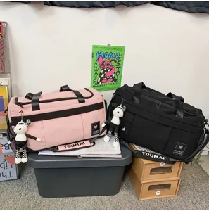 Large capacity travel duffel bag for students, sports fitness gym bag and luggage organizer.