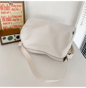 Detailed close-up view of the minimalist clean white fitness shoulder bag with strap.