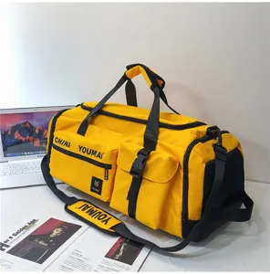 Große gelbe Reisetasche Sporttasche Fitness Tasche mit vielen Fächern und praktischen Gurten.