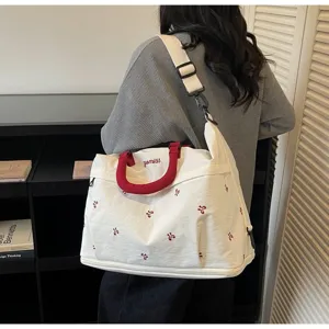 Expandable large capacity travel duffel bag with red handles and cute embroidery for daily.