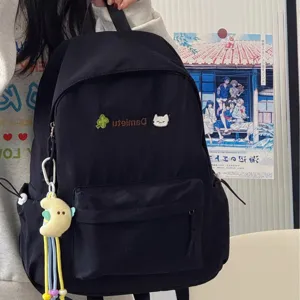 Japanese style ins casual backpack for women, lightweight nylon school bag with cute embroidery.