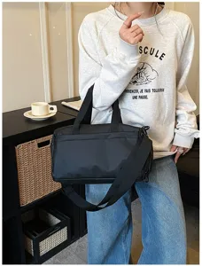 Waterproof sports gym bag for men and women, portable shoulder duffel bag for travel.