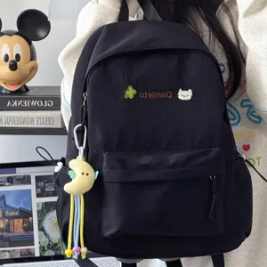 Casual black backpack with cute embroidery and keychain, lightweight daypack for daily use