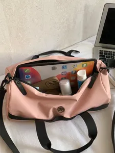 Kleine waterdichte sport yoga fitness tas voor dames, roze cilindrische reistas fijn.