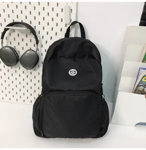 Black lightweight waterproof travel backpack casual school bag with front zipper pocket