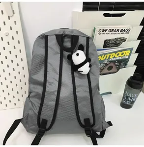 Lightweight waterproof travel backpack for outdoor sports, casual grey rucksack daily use.