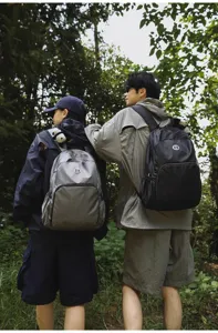 Outdoor waterproof travel backpack, large capacity casual daypack for hiking and cycling.