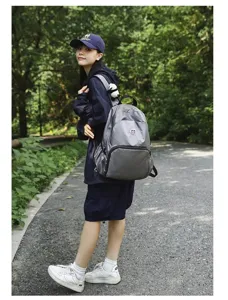 Outdoor travel backpack detail view, featuring durable waterproof material and comfortable straps.
