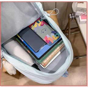 Lightweight simple solid color casual versatile student backpack school bag for daily use.