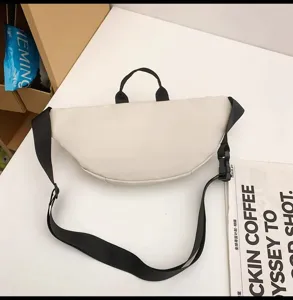 Casual crescent crossbody bag for women and men, stylish minimalist daily sling shoulder bag.