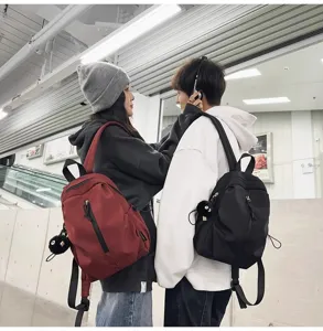 Casual lightweight canvas backpack for daily commute, stylish durable daypack for men women.