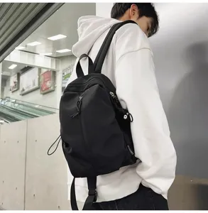 Stylish casual black lightweight backpack for daily travel, school and outdoor use.