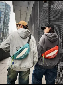 Trendy streetwear crossbody chest bag for men and women, casual waist bag with adjustable straps.