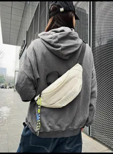 Fashion casual crossbody bag for men and women, streetwear chest bag, stylish daily wear.