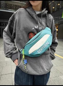 Trendy casual nylon crossbody chest bag for women and men, stylish street style shoulder bag.