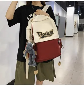 Casual canvas backpack for women students, stylish colorblock school bag for travel daily.