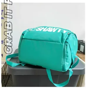 Sac à dos tactique turquoise de grande capacité, vue détaillée du tissu résistant.