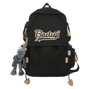 Black canvas backpack for women and men, casual large capacity travel school bag with cute pendant.
