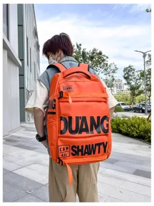 Grand sac à dos tactique pour homme et femme, sac d'école élégant de couleur orange.